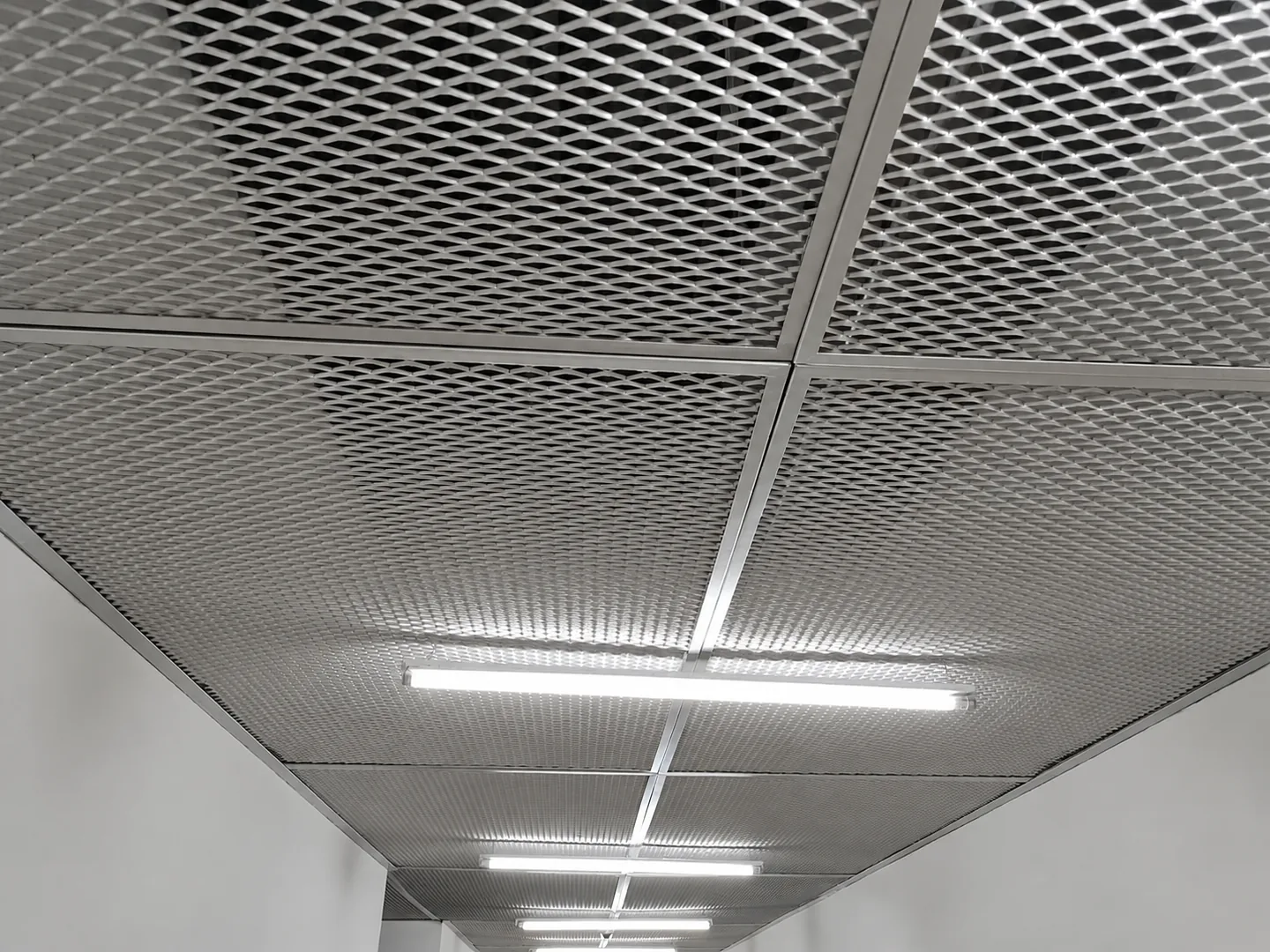 Expanded metal mesh ceiling installed in a framed grid
